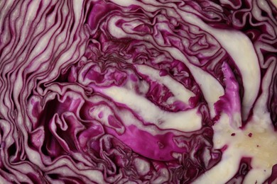 Photo of Cut fresh red cabbage as background, closeup