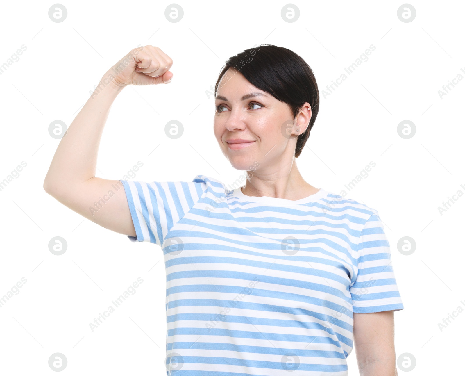 Photo of Strength. Beautiful woman showing her biceps on white background