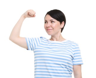 Photo of Strength. Beautiful woman showing her biceps on white background
