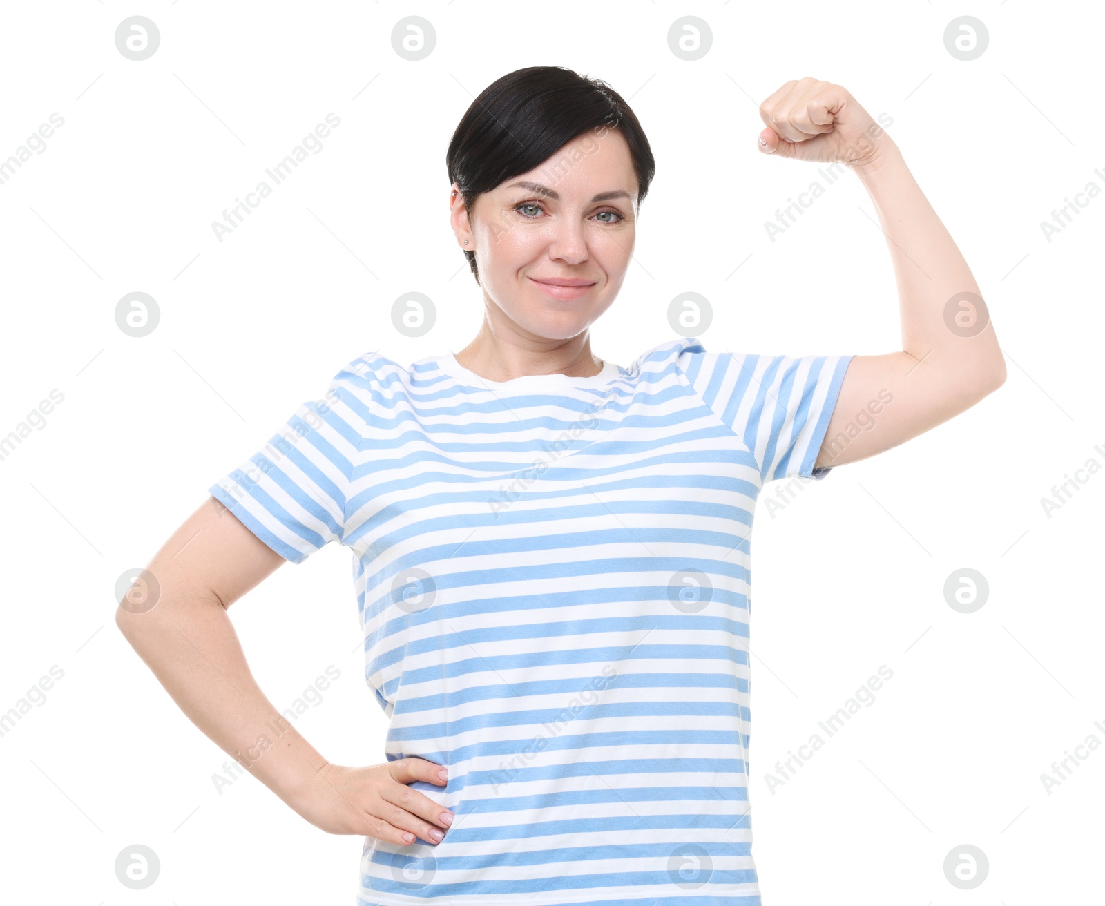 Photo of Strength. Beautiful woman showing her biceps on white background