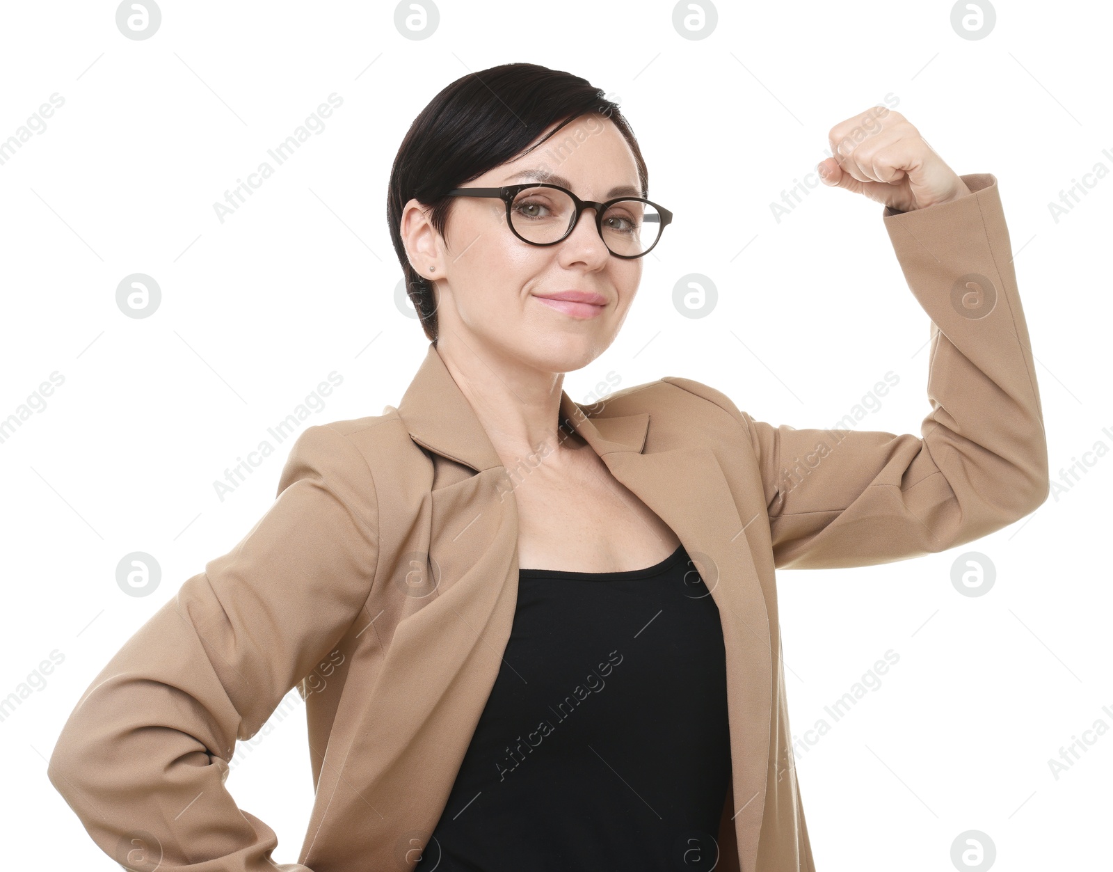 Photo of Strength. Beautiful businesswoman in glasses and suit showing her biceps on white background