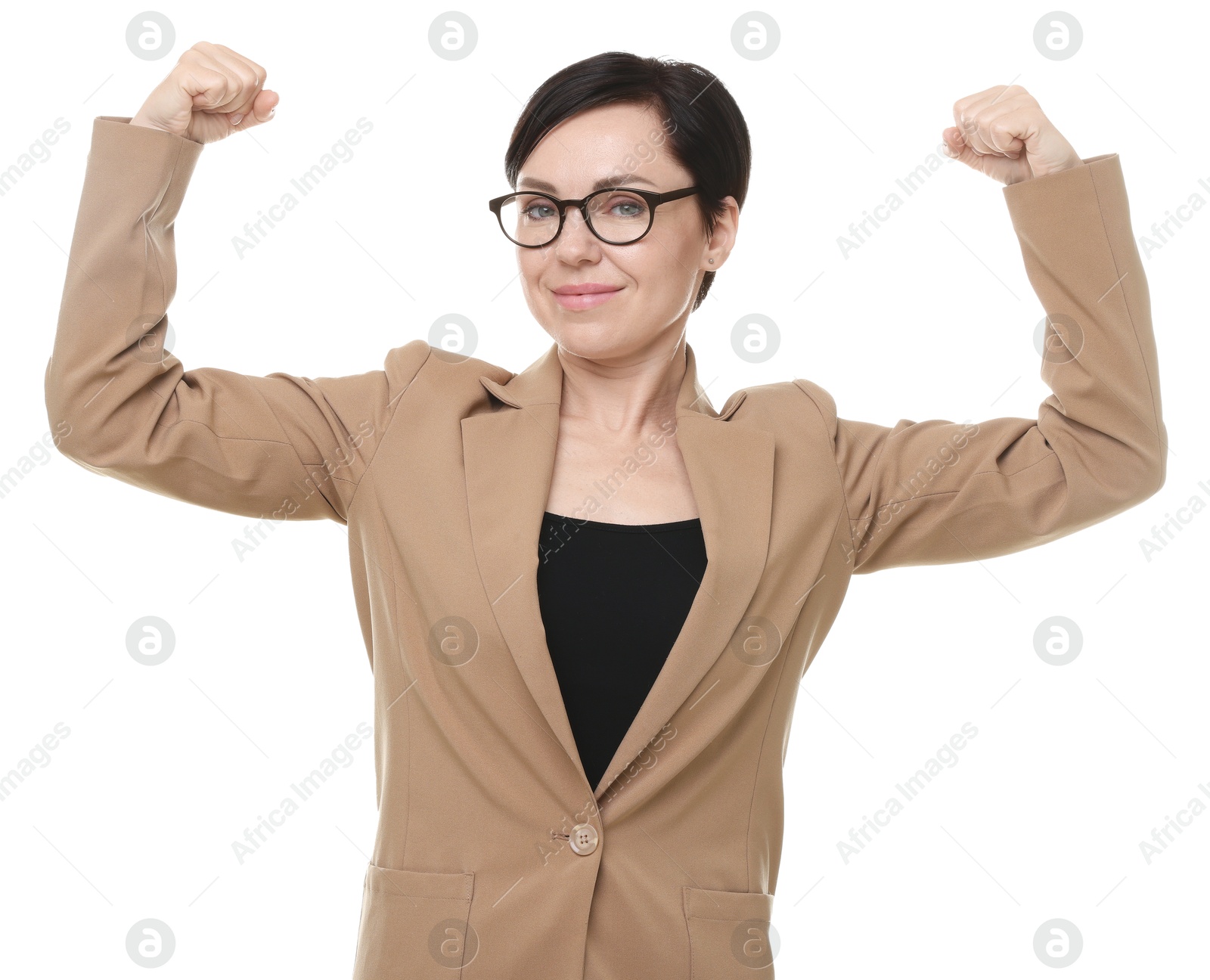 Photo of Strength. Beautiful businesswoman in glasses and suit showing her biceps on white background