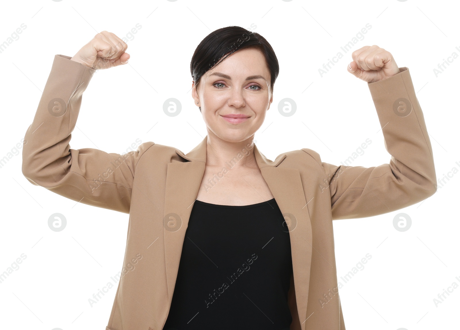 Photo of Strength. Beautiful businesswoman in suit showing her biceps on white background