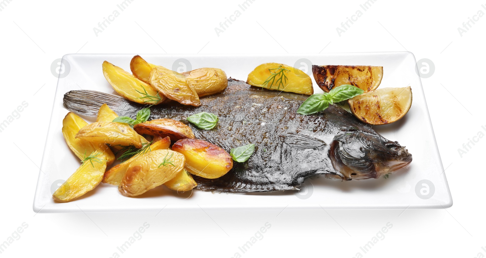 Photo of Tasty roasted flounder fish with potatoes, basil and lemon slices isolated on white. Homemade seafood dish