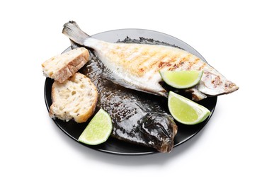 Photo of Tasty roasted flounder fish with bread and lime slices isolated on white. Homemade seafood dish