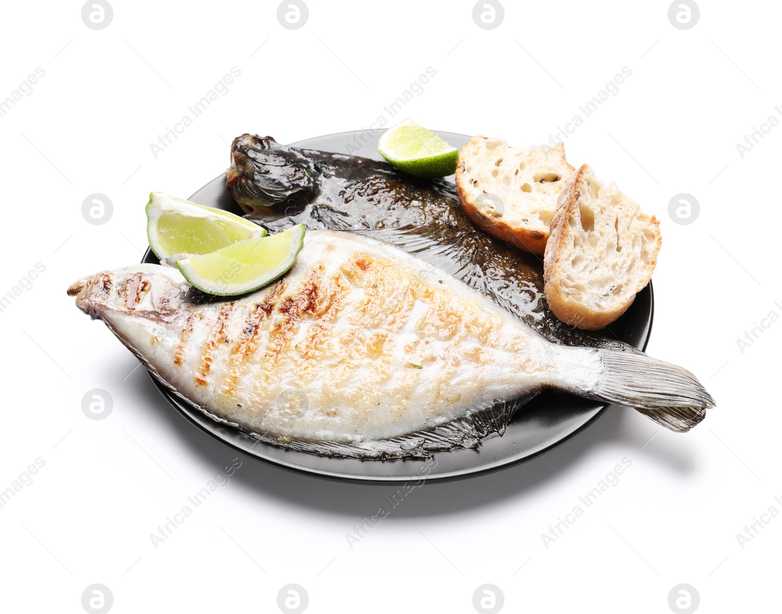 Photo of Tasty roasted flounder fish with bread and lime slices isolated on white. Homemade seafood dish