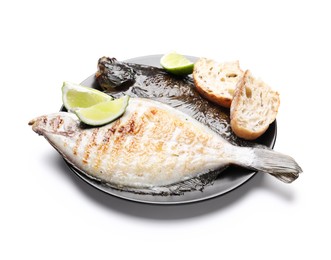 Photo of Tasty roasted flounder fish with bread and lime slices isolated on white. Homemade seafood dish