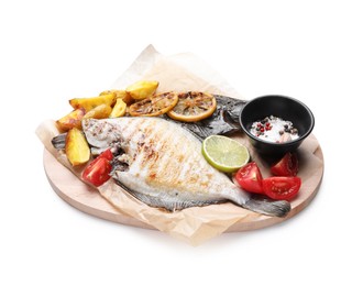 Photo of Tasty roasted flounder fish with potatoes, tomatoes and lemon slices isolated on white. Homemade seafood dish