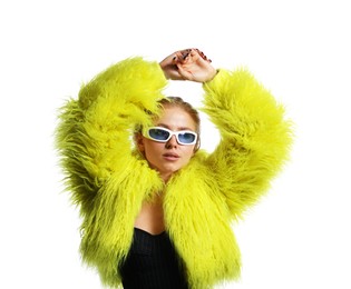 Photo of Beautiful woman in stylish sunglasses and fur coat posing on white background
