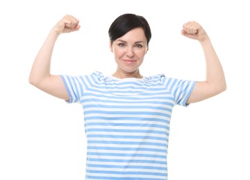 Photo of Strength. Beautiful woman showing her biceps on white background