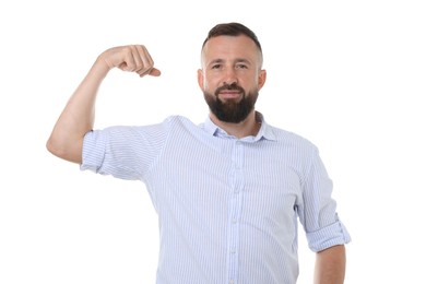 Photo of Strength. Handsome man showing his biceps on white background