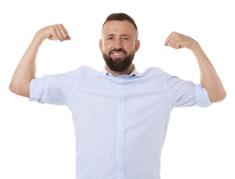 Photo of Strength. Smiling man showing his biceps on white background