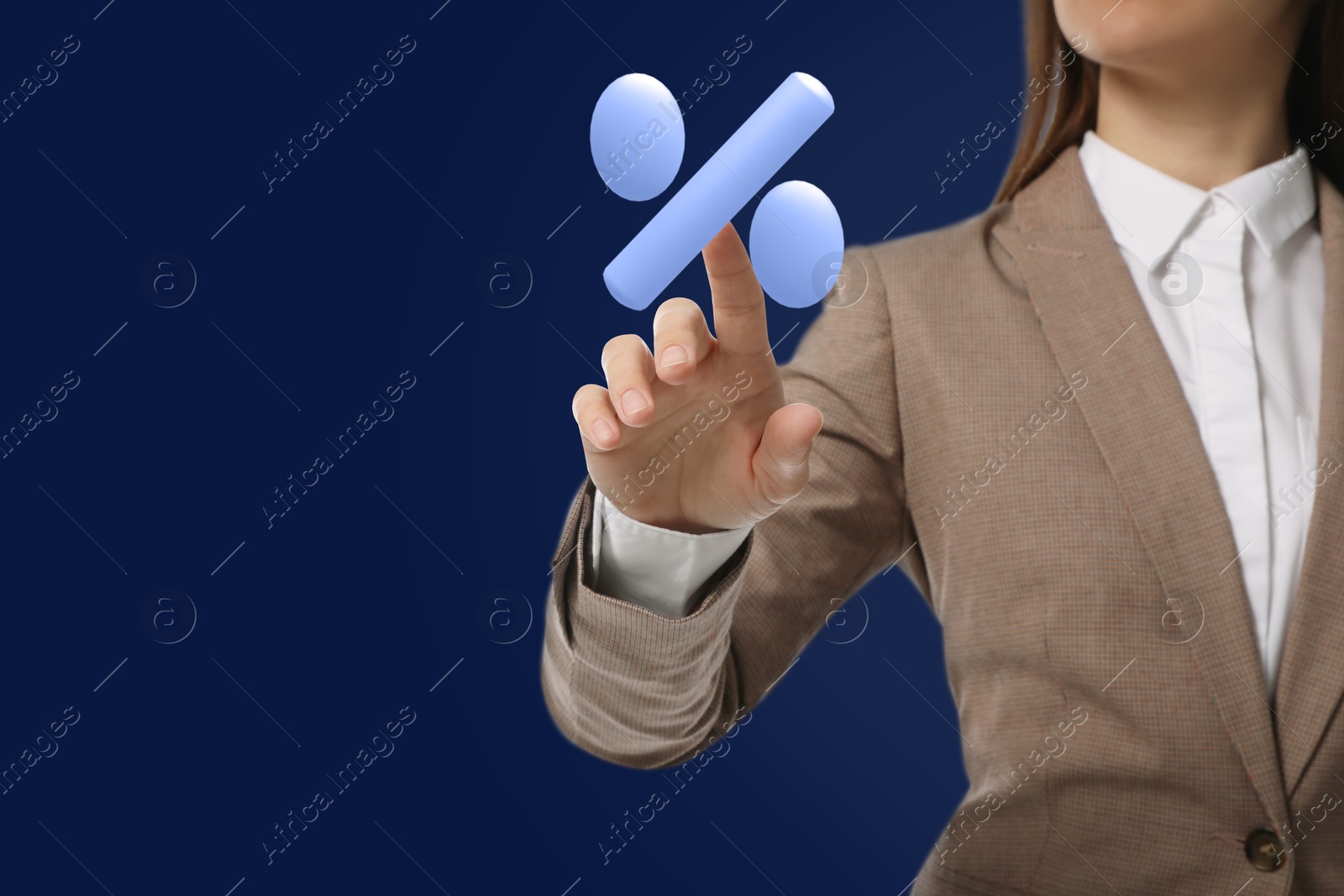 Business woman touching virtual percent sign against dark blue background, closeup Image of Business woman touching virtual percent sign against dark blue background, closeup