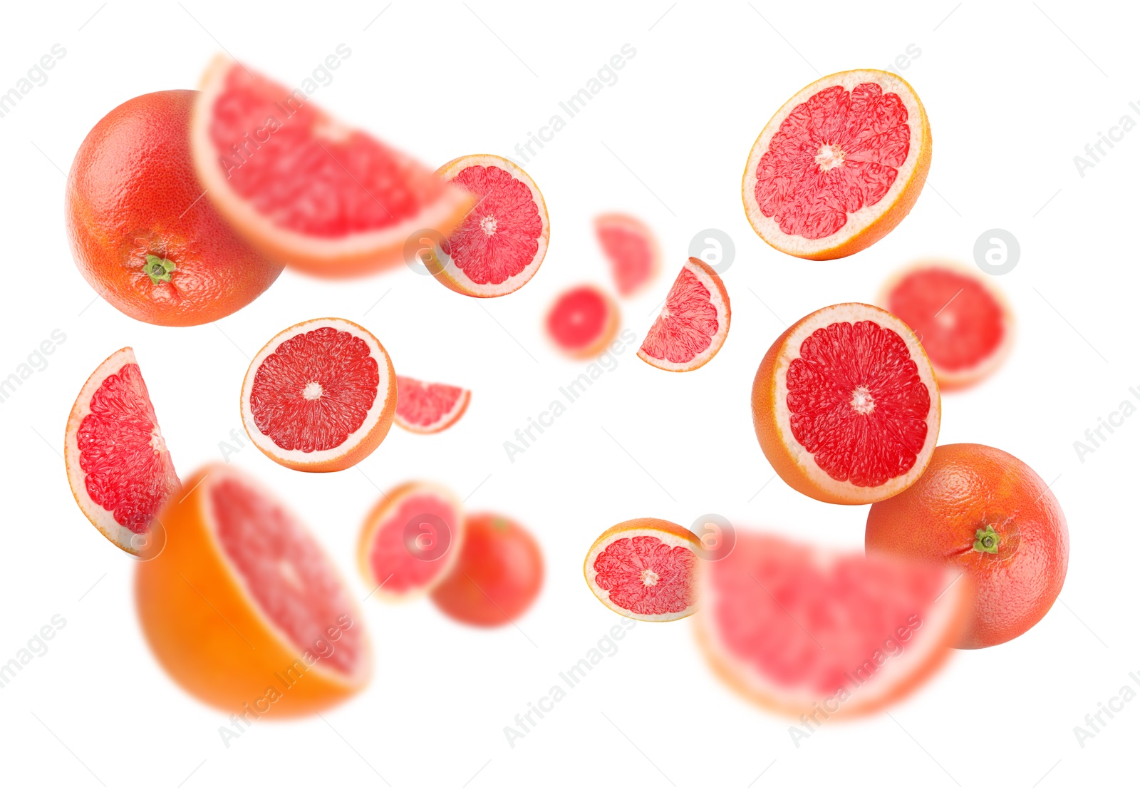 Image of Fresh grapefruits swirling in air against white background