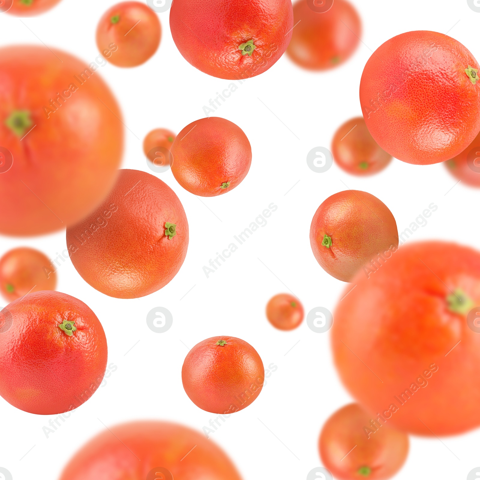 Image of Fresh grapefruits swirling in air against white background