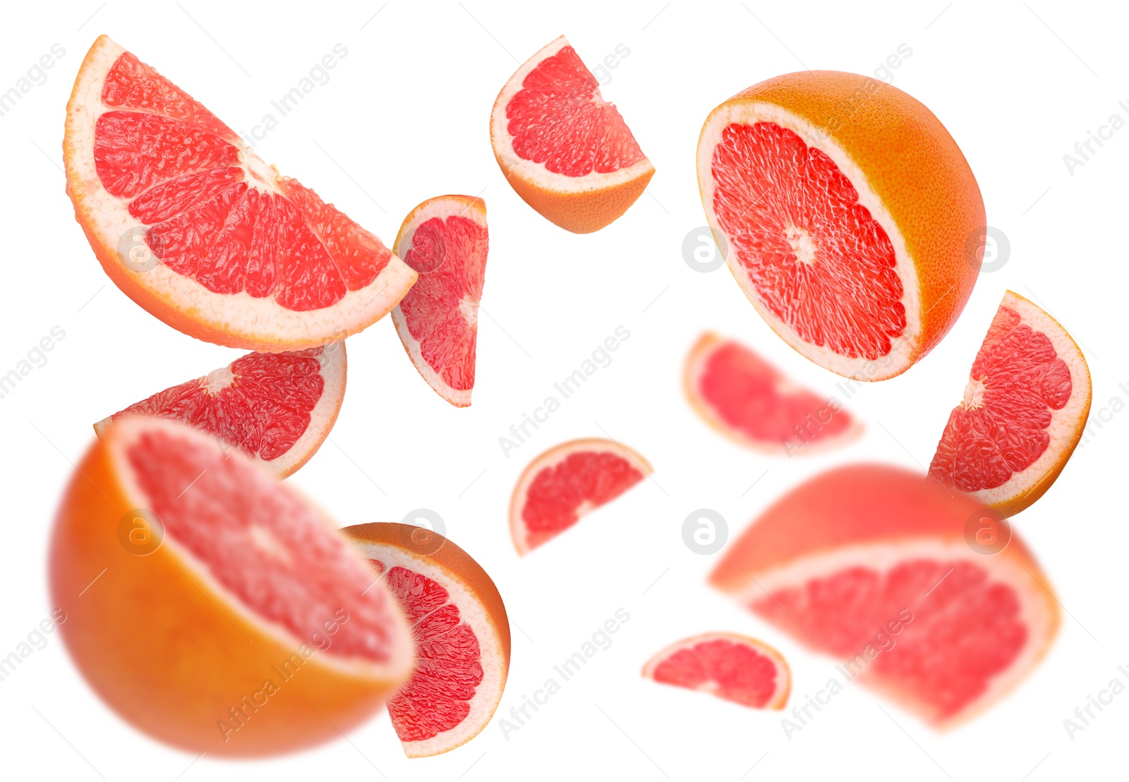 Image of Fresh grapefruits swirling in air against white background