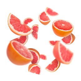 Image of Fresh grapefruits swirling in air against white background