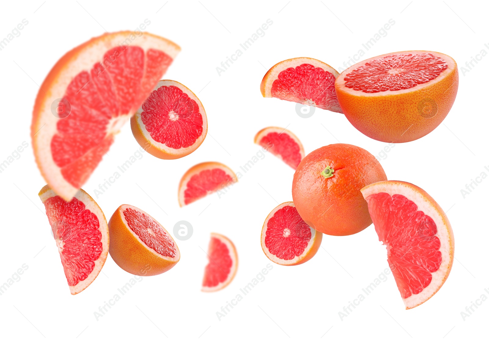 Image of Fresh grapefruits swirling in air against white background