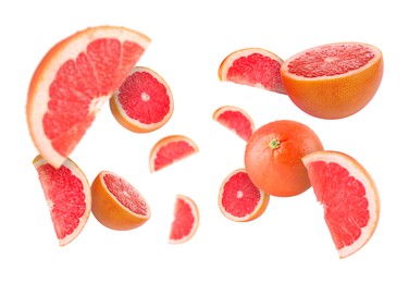 Image of Fresh grapefruits swirling in air against white background