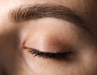 Photo of Eyebrow styling. Young woman with beautiful eyebrow, closeup