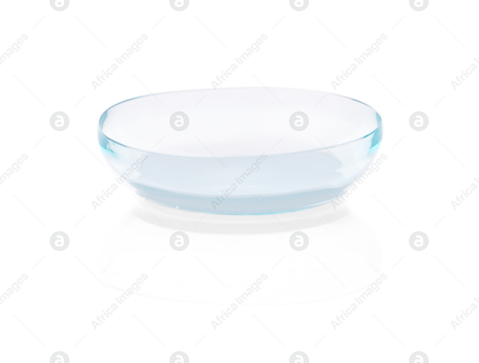 One transparent contact lens isolated on white Photo of One transparent contact lens isolated on white