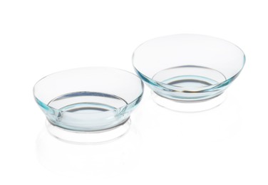 Photo of Pair of contact lenses isolated on white