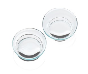 Photo of Pair of contact lenses isolated on white, above view