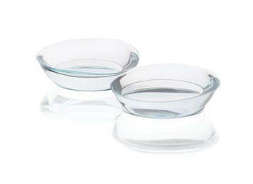 Photo of Pair of contact lenses isolated on white