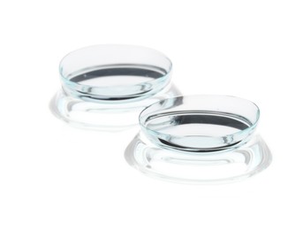 Photo of Pair of contact lenses isolated on white