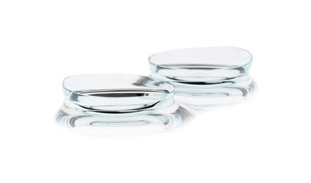 Photo of Pair of contact lenses isolated on white