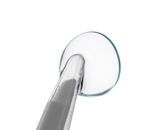 Photo of Tweezers with contact lens isolated on white