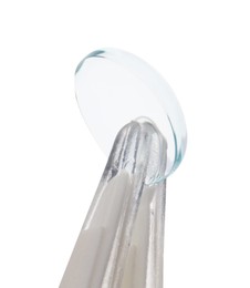 Photo of Tweezers with contact lens isolated on white