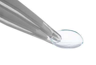 Photo of Tweezers with contact lens isolated on white