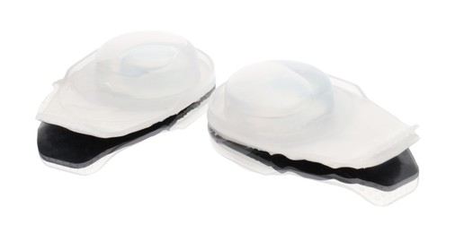 Photo of Blister packs with contact lenses isolated on white