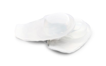 Photo of Blister packs with contact lenses isolated on white