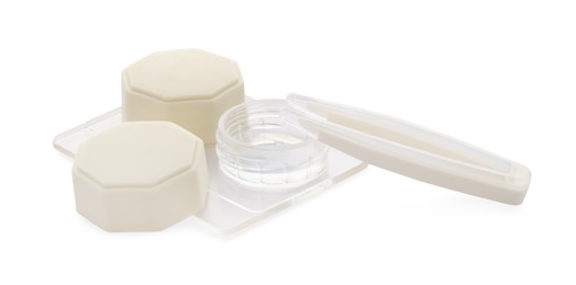 Photo of Case with contact lenses and tweezers isolated on white