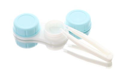 Photo of Case with contact lenses and tweezers isolated on white