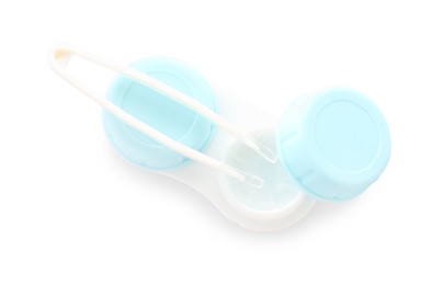 Photo of Case with contact lenses and tweezers isolated on white, top view