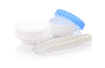 Photo of Case with contact lenses and tweezers isolated on white