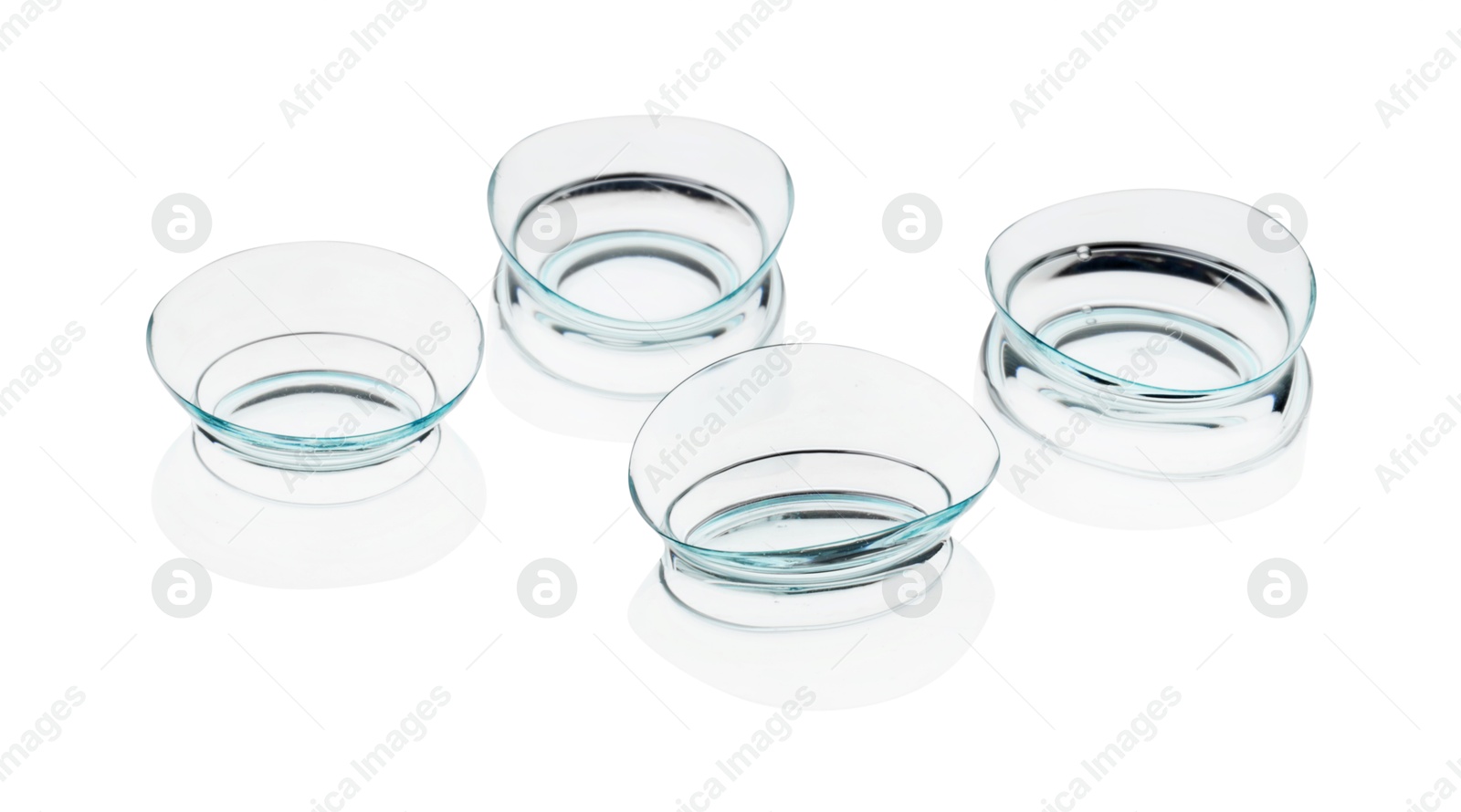 Many transparent contact lenses isolated on white Photo of Many transparent contact lenses isolated on white