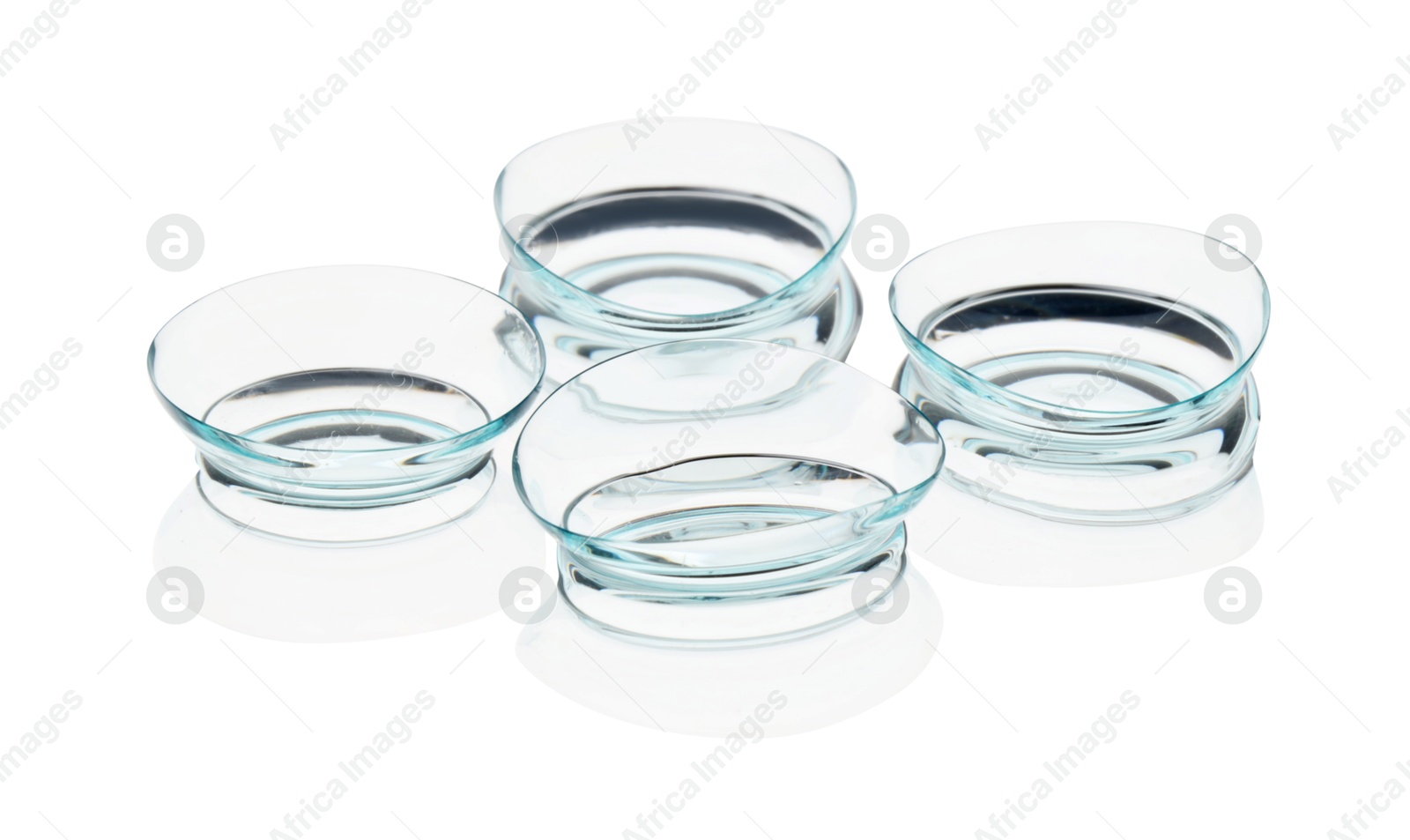 Many transparent contact lenses isolated on white Photo of Many transparent contact lenses isolated on white