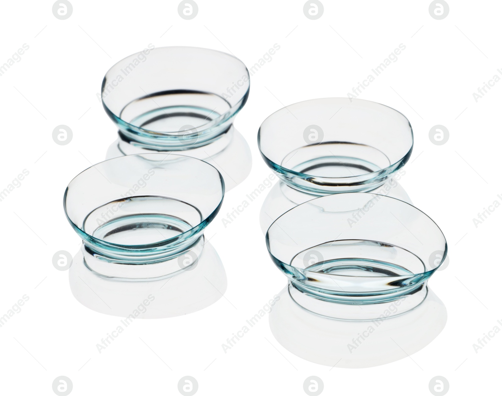 Many transparent contact lenses isolated on white Photo of Many transparent contact lenses isolated on white