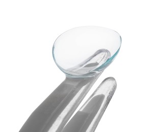 Photo of Tweezers with contact lens isolated on white