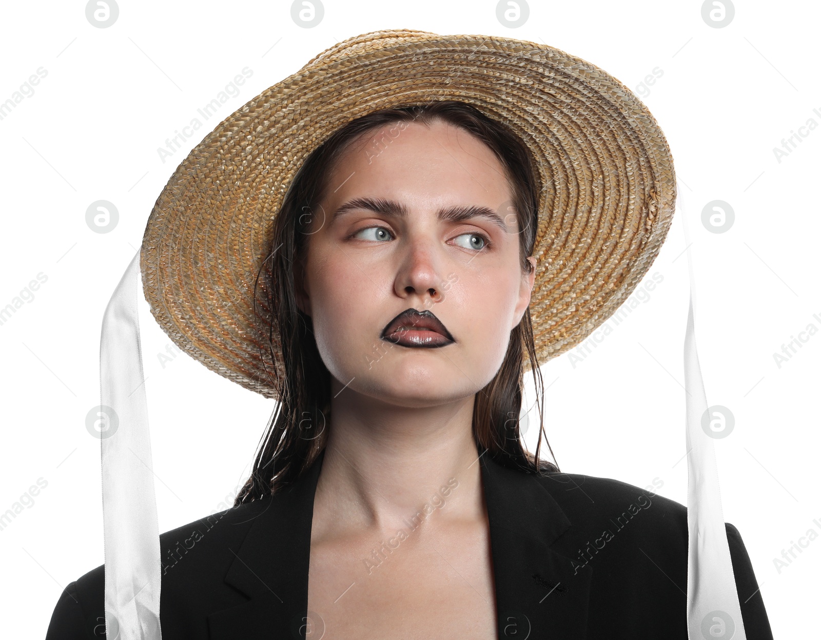 Photo of Beautiful young woman with black lip liner wearing straw hat on white background