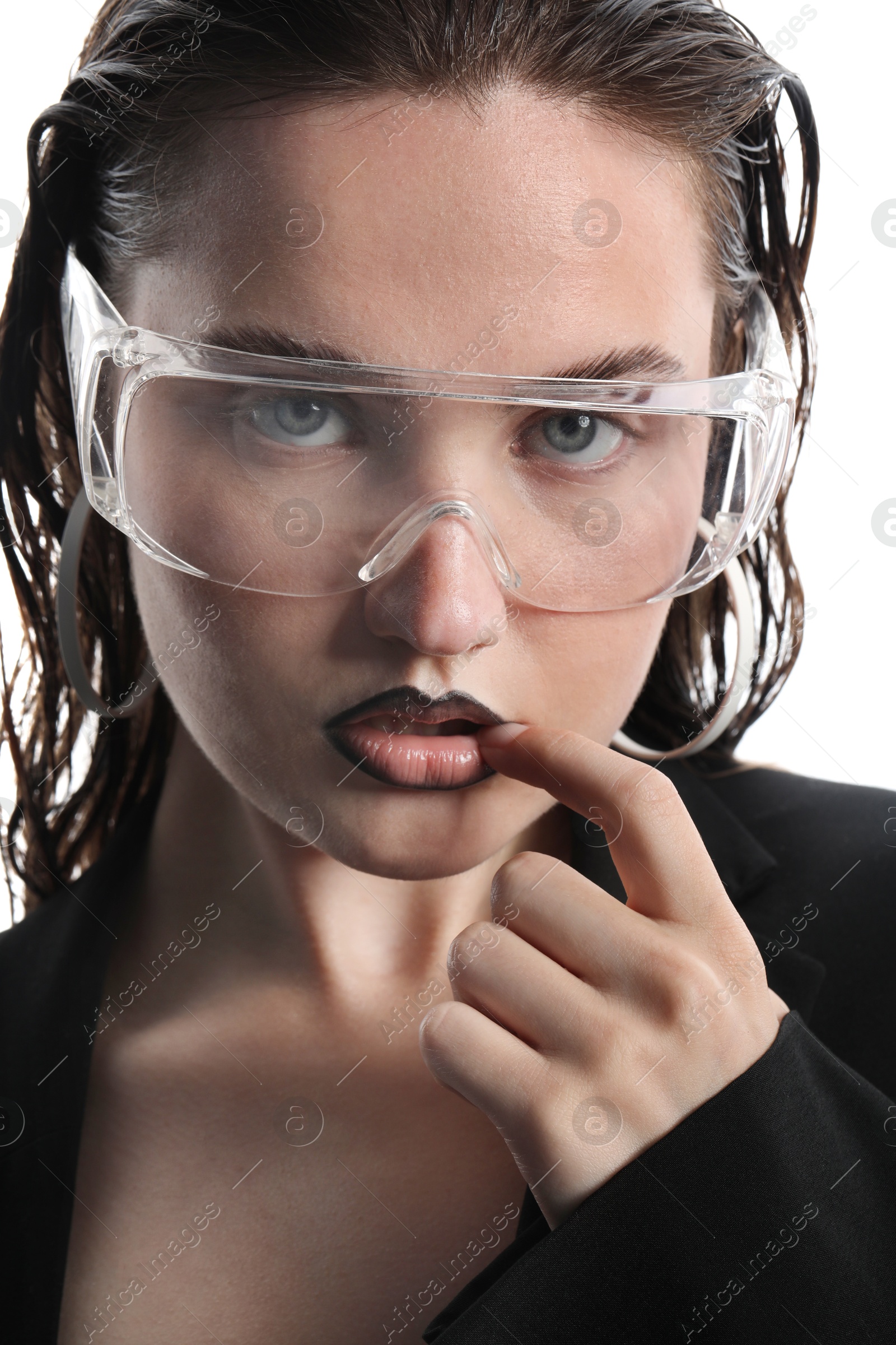 Photo of Beautiful young woman with black lip liner wearing glasses on white background, closeup
