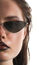 Photo of Beautiful young woman with black lip liner wearing wet sunglasses on white background, closeup