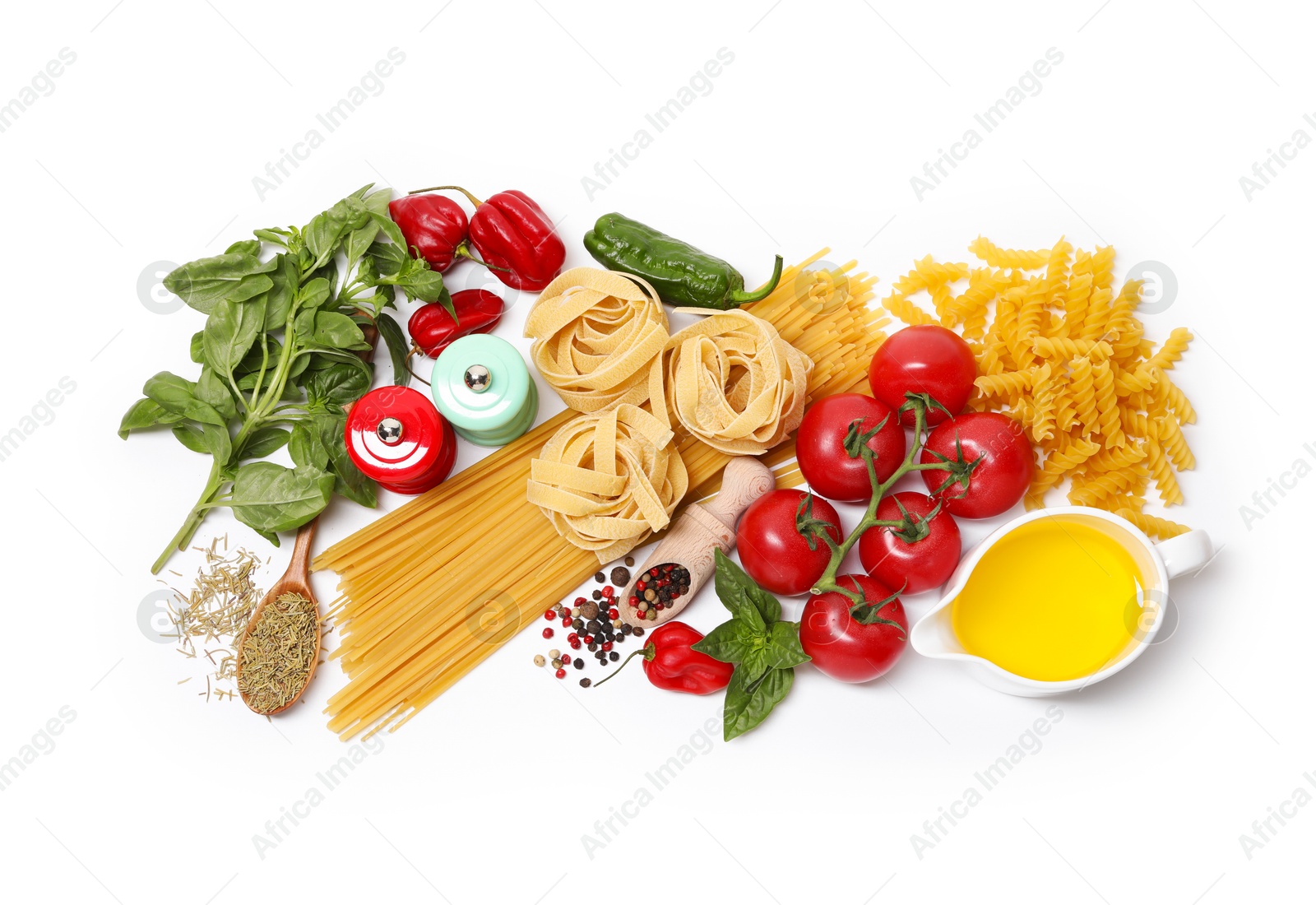 Photo of Different types of pasta and ingredients isolated on white, top view