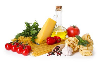 Photo of Different types of pasta and ingredients isolated on white