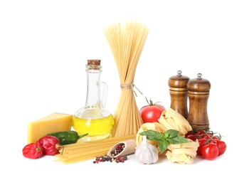 Photo of Different types of pasta and ingredients isolated on white
