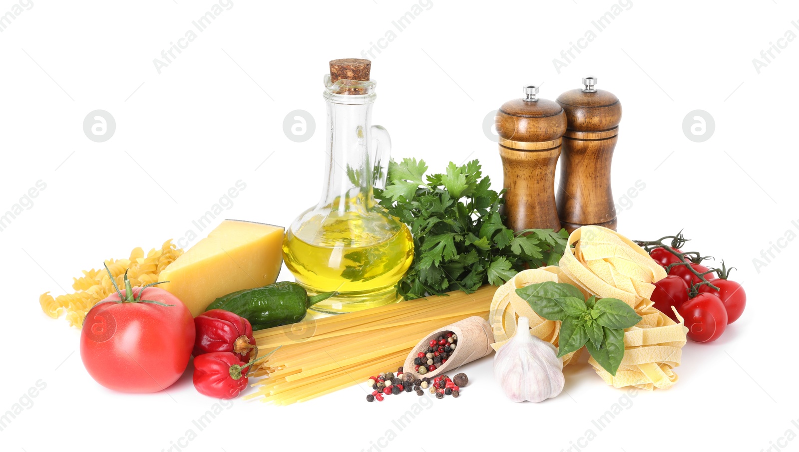Photo of Different types of pasta and ingredients isolated on white